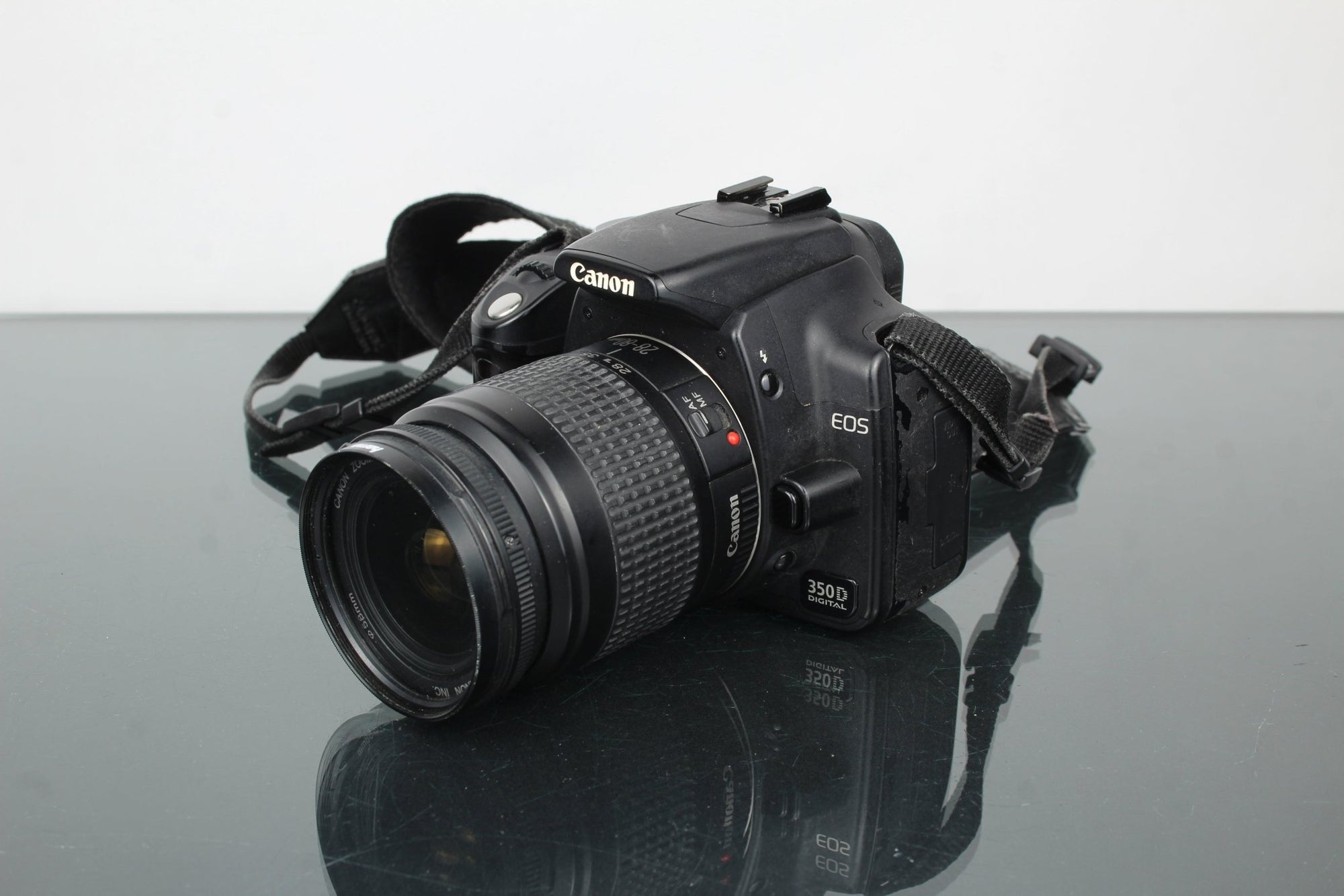 Canon EOS 350D + 28 - 80mm canon lens - Dutch|Thrift